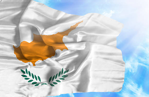 istock Cyprus waving flag against blue sky with sunrays 470547815
