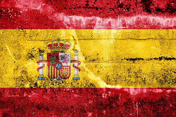 istock Spain Flag painted on grunge wall 470553405