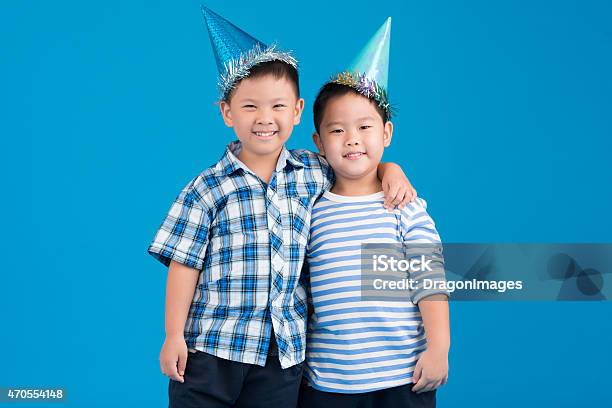 Friends In Party Hats Stock Photo - Download Image Now - Child, Party Hat, Cut Out