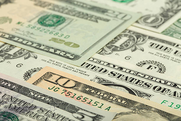 istock USA dollar money banknotes texture background 470557024