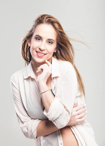 istock Attractive young model in underwear against white background 470557209