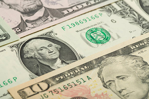 istock USA dollar money banknotes texture background 470559894