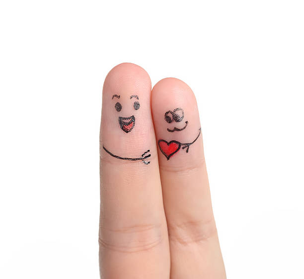 istock Painted finger smiley on red background, valentine concept. 470579597
