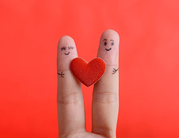 istock Painted finger smiley on red background, valentine concept. 470579609