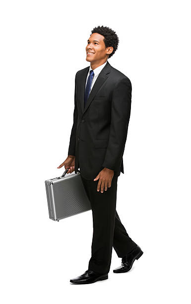 istock Latin business man walking with briefcase 470580317