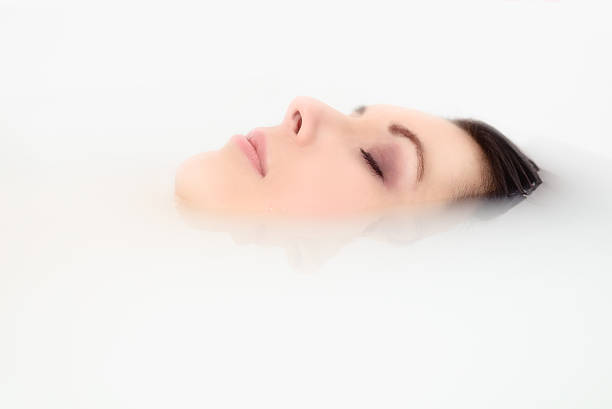 istock Blissful woman soaking in a hot bath 470580503