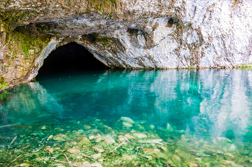 Water cave under massive rocks in Plitvice Lakes National Park