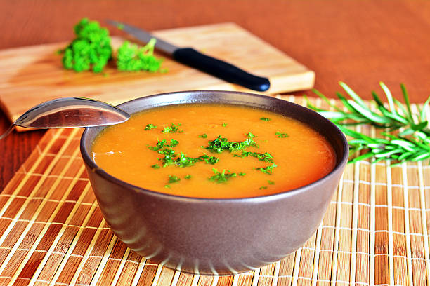 istock Pumpkin Creme Soup In The Bowl With Parsley 470591414