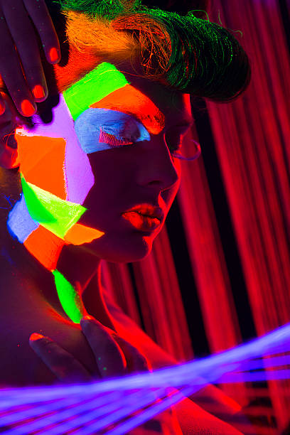 istock Women Portrait in Ultraviolet Light 470591731