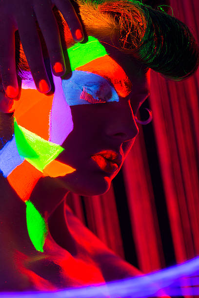 istock Women Portrait in Ultraviolet Light 470591983