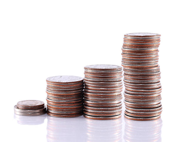 istock Savings, increasing columns of coins isolated on white background. 470598726