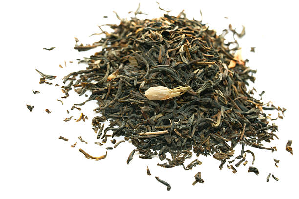 istock Green tea with jasmine isolated on white. 470598869