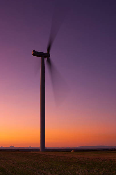istock Windfarm at sunset and sky with dust from volcano 470598896