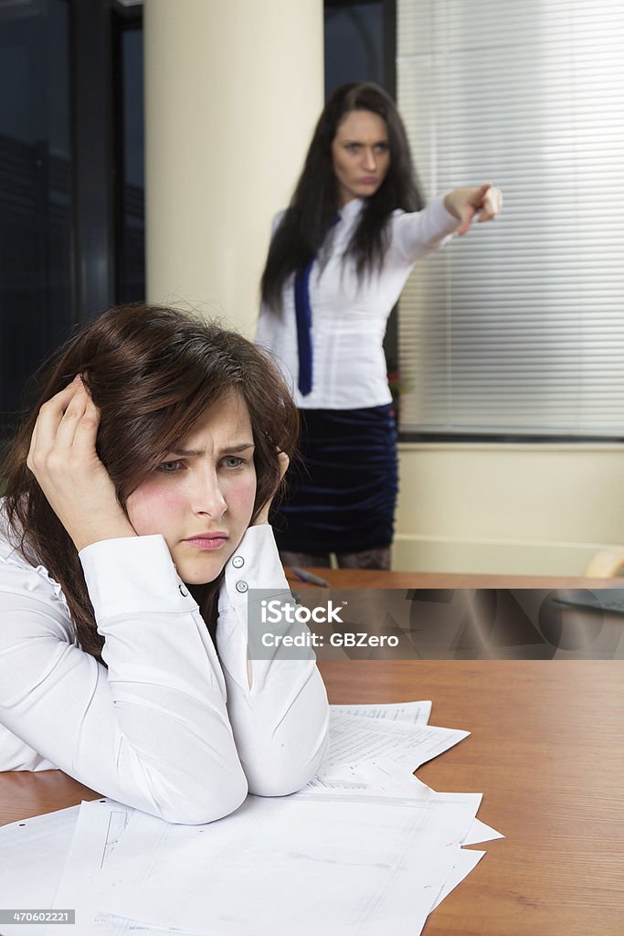 Angry business woman screaming :You are fired! 20-24 Years Stock Photo
