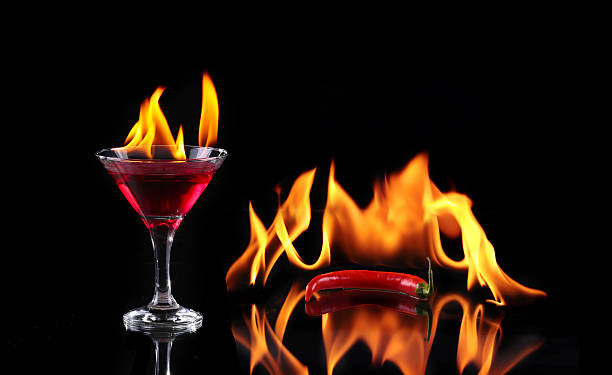 collage flaming cocktail auf schwarz - martini brand vermouth stock-fotos und bilder
