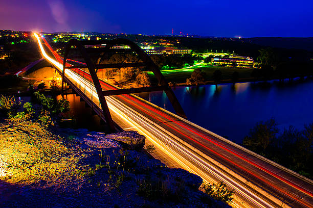 istock Pennybacker Bridge or 360 bridge Long Exposure with Cliff Lit up 470603782