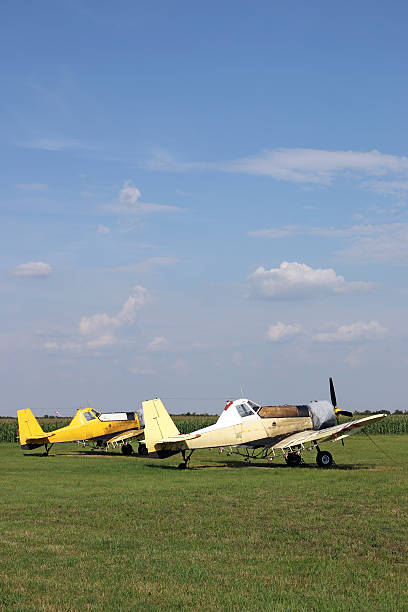 istock two crop duster airplanes on airfield 470606948