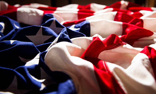 istock American flag with folds. Side view. Dramatic lighting. Patriotism. 470608956