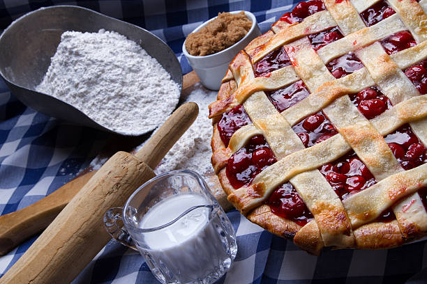 istock Fresh Hot Homeade Cherry Lattice Pie with Ingredients 470609186