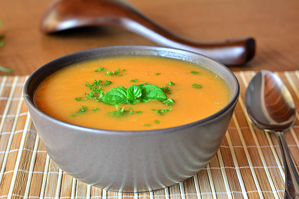 istock Pumpkin Creme Soup In The Bowl With Parsley 470609380