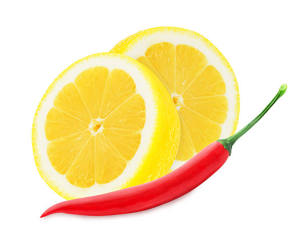 istock Juicy yellow lemon with a red chilli pepper 470610894