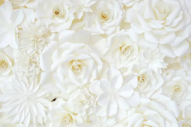 Background of paper-folding flower in white cream color