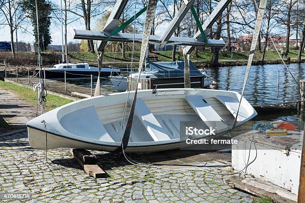 Boat On The Quay Ready For Lifting Into The Water Stock Photo - Download Image Now - 2015, Beach, Boathouse