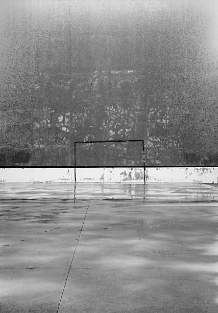 istock Football soccer game post painted in a concrete wall 470616928