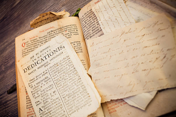istock Open religious 300 years old roman book with calligraphy 470617736