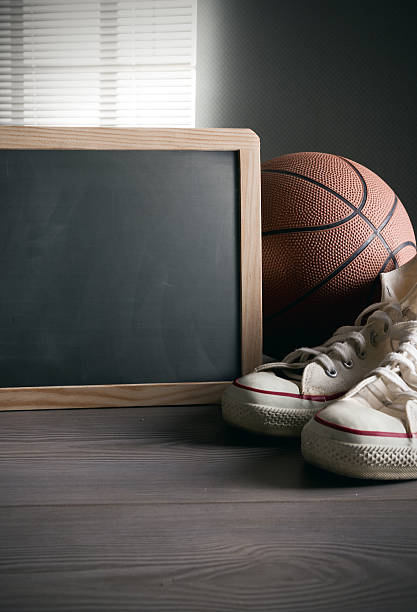 istock Blackboard with canvas shoes and basketball 470618069