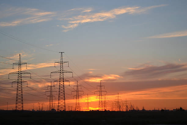 istock Electric power transmission lines at sunset. 470618120