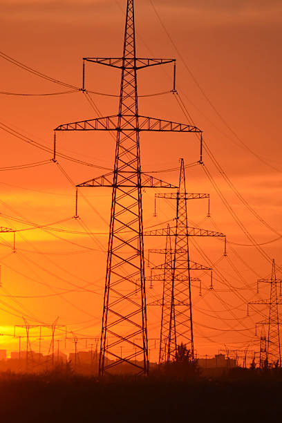 istock Electric power transmission lines at sunset. 470618134