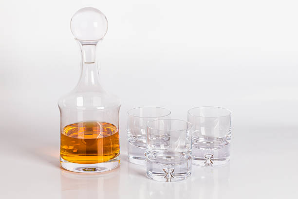 Scotch crystal bottle, with glasses and a drink