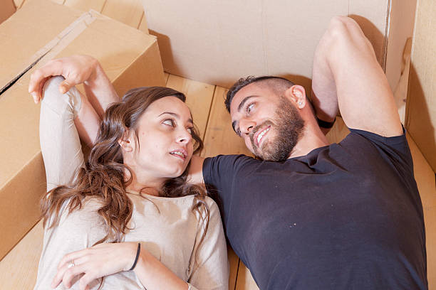 istock young couple relaxing after moving 470621232