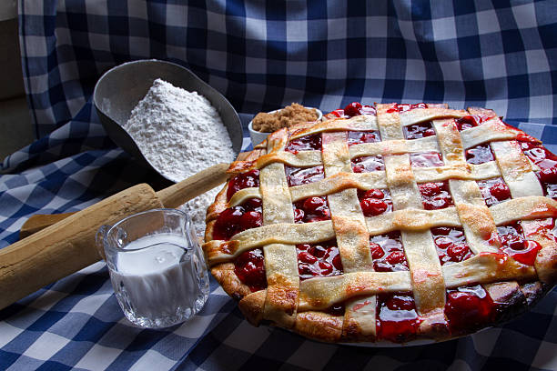 istock Fresh Hot Homeade Cherry Lattice Pie with Ingredients 470622232