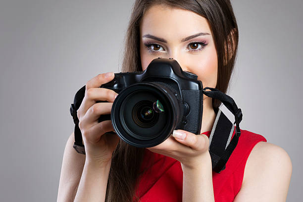 istock Beauty woman with photo camera 470623540