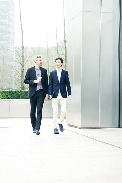 istock Business People Discussing Project Outdoors, Cityscape On The Background 470624056