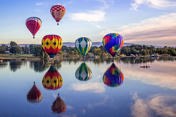 Prosser, WA, USA - September 27, 2014: The 25th Annual Great Prosser Balloon Rally. Giant balloons fly over Yakima river