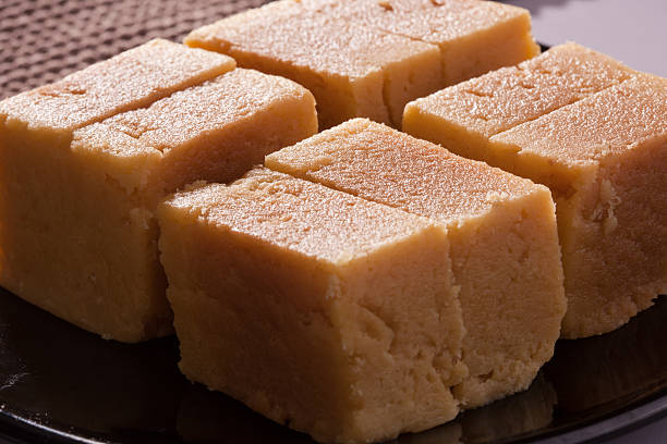 istock Mysore Pak is a sweet dish made from lentil flour. 470625137