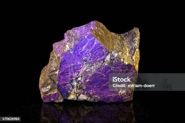 Purpurite Mineral Stone In Front Of Black Stock Photo - Download Image Now - 2015, Bizarre, Blue