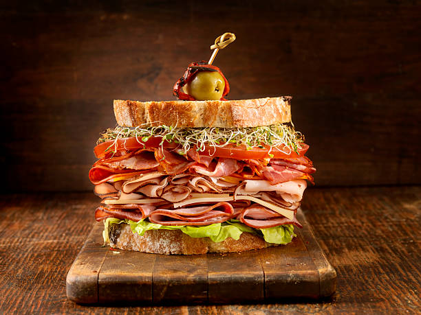 Turkey, Ham and Prosciutto Sandwich with Tomatoes,Butter Lettuce,Cheese and Sprouts -Photographed on Hasselblad H3D-39mb Camera