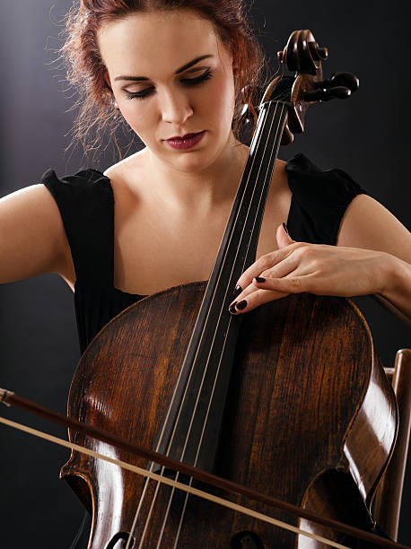 istock Closeup of a beautiful cellist 470628304