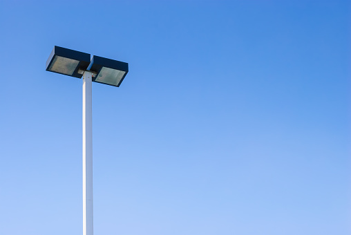 Led Street Lamps Post On Blue Sky Background