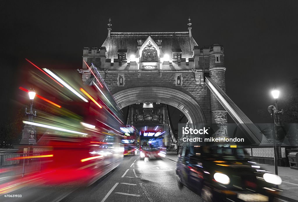 Tower Bridge and Traffic Color Mix A view of the entrance to Tower Bridge with typical London traffic with a color mix effect England Stock Photo