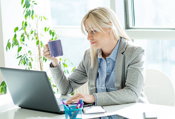 istock business woman in the office 470634300