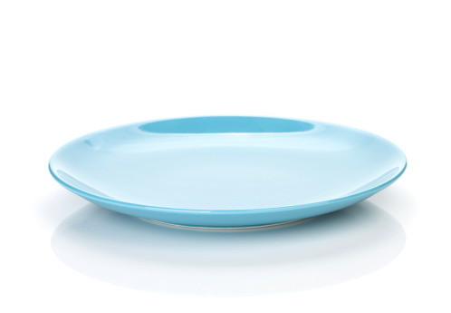 Blue empty plate. Isolated on white background