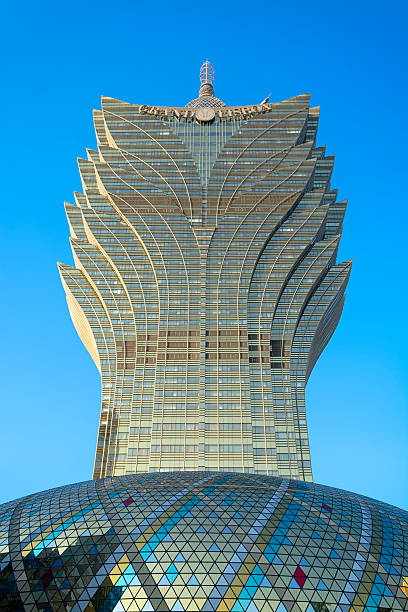 Macao, Macau S.A.R - November 16,2014: The Grand Lisboa in Macao. Grand Lisboa is a 47-floor, hotel in Macau, owned by Sociedade de Turismo e Diversões de Macau and designed by Dennis Lau and Ng Chun Man. 