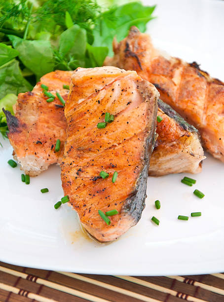 istock grilled salmon and salad 470640597