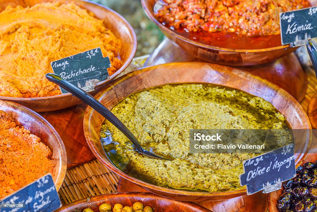 Lourmarin, Provencal Market - United Kingdom Homemade dressing/sauces at the weekly Provencal market of Lourmarin, a village in the Vaucluse department. Provence-Alpes-Côte d'Azur region, southeastern France. -selective focus- 2015 Stock Photo