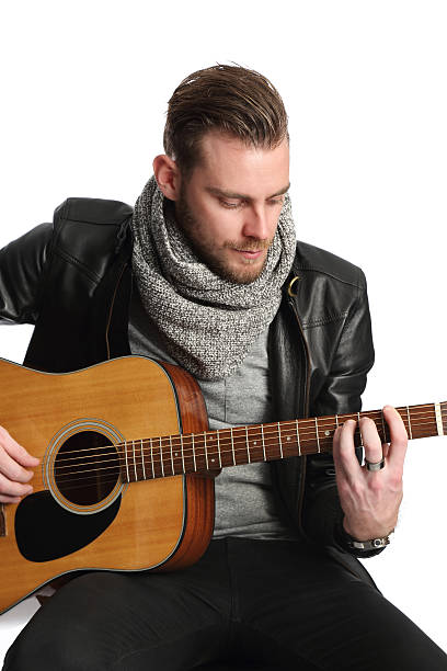 istock Singer songwriter with an acoustic guitar 470642654